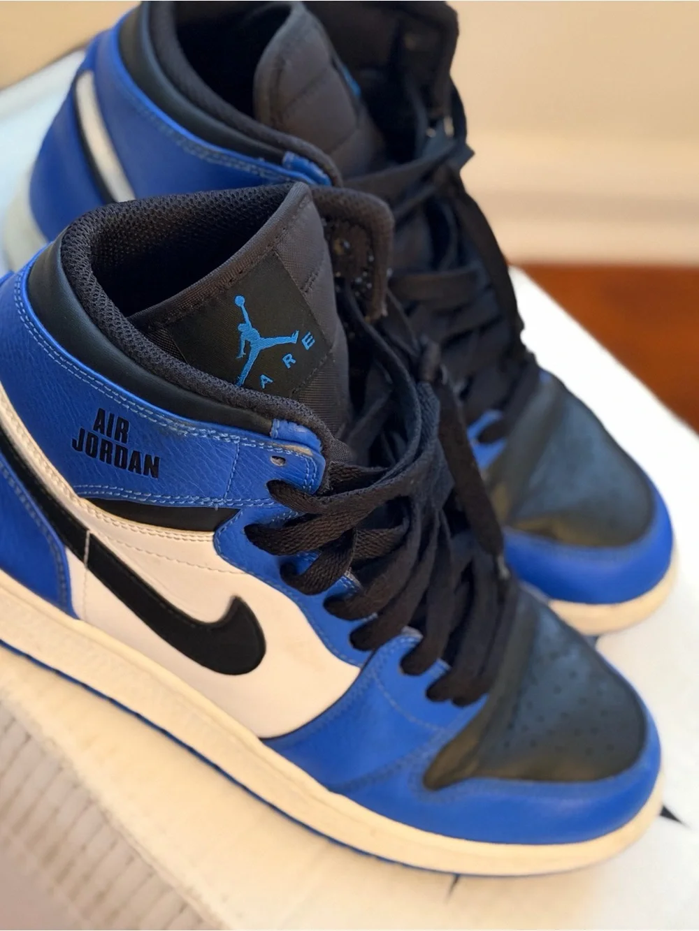 Jordan Men’s High-Top Sneakers in Blue/Black/White